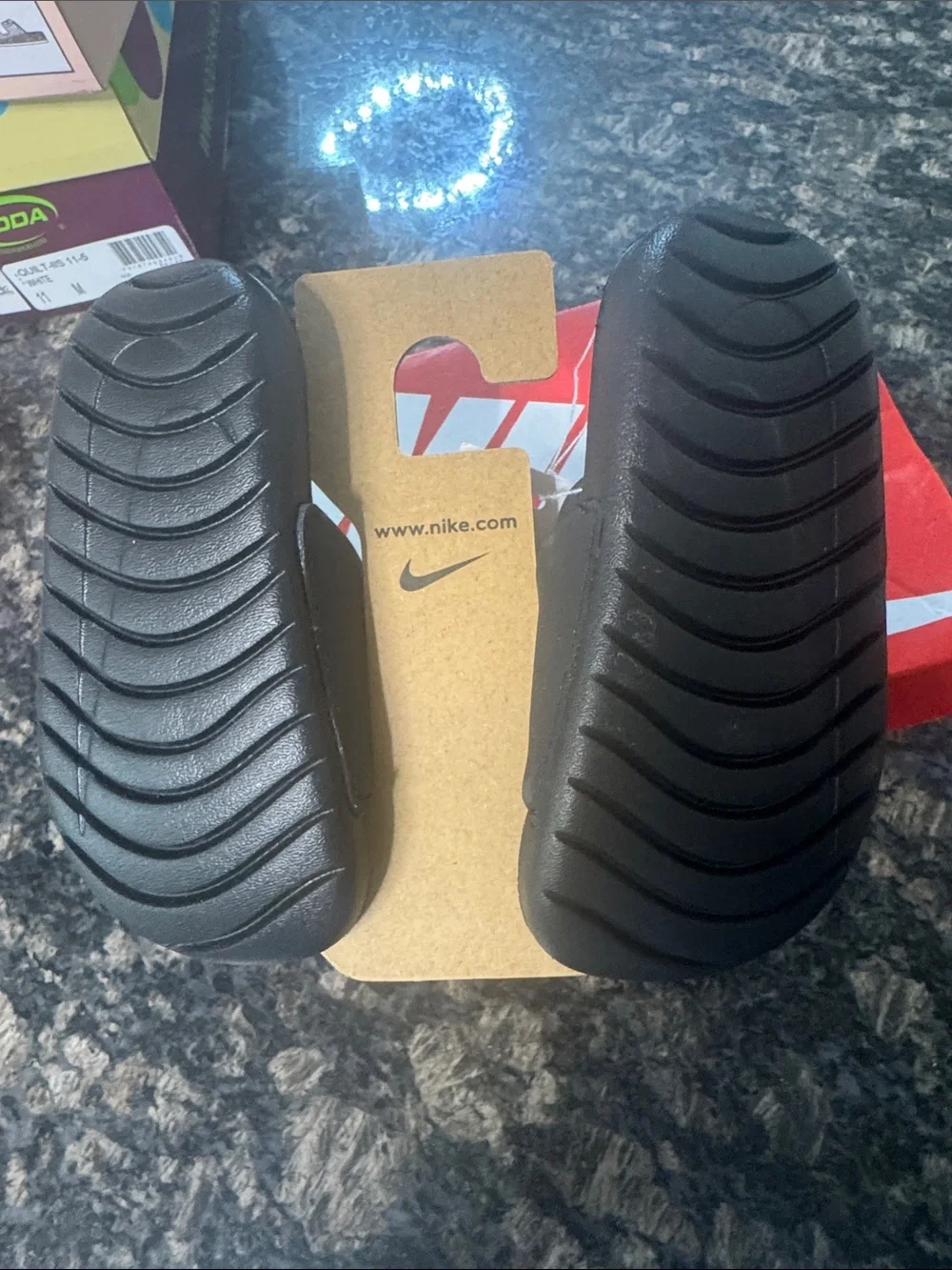Nike Black Slide Sandals with White Swoosh Accent